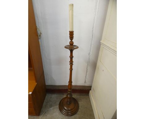 A mahogany standard lamp 