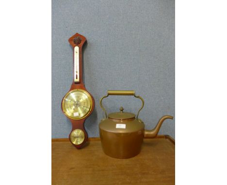 A copper kettle and a mahogany aneroid barometer 