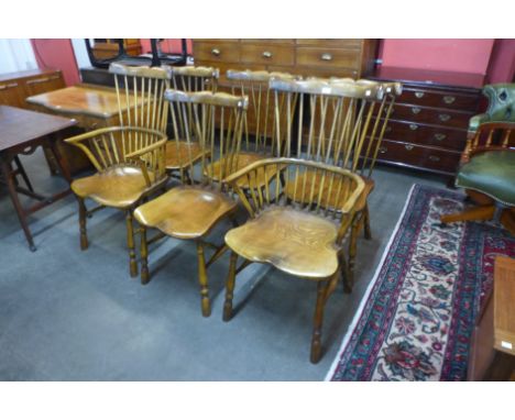 A set of six primitive style elm stick-back Windsor chairs 