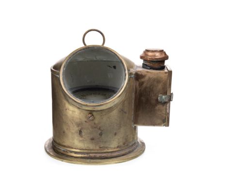 EARLY 20TH CENTURY SHIP'S BRASS BINNACLE COMPASS, the brass hood with swing handle and glass aperture revealing a white ename