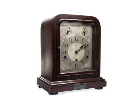 EDWARDIAN MANTEL CLOCK, the engraved silverised dial with Arabic numerals and 8 day chiming movement, contained in a mahogany