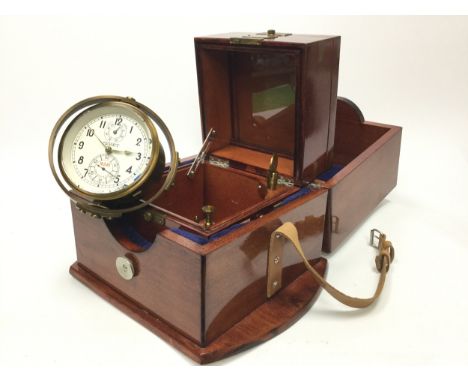 RUSSIAN SOVIET-ERA MOVET CHRONOMETER, numbered 16345, the silvered dial with Arabic numerals, 12cm diameter, contained in a b