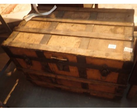 Large antique metal and wood bound luggage trunk
