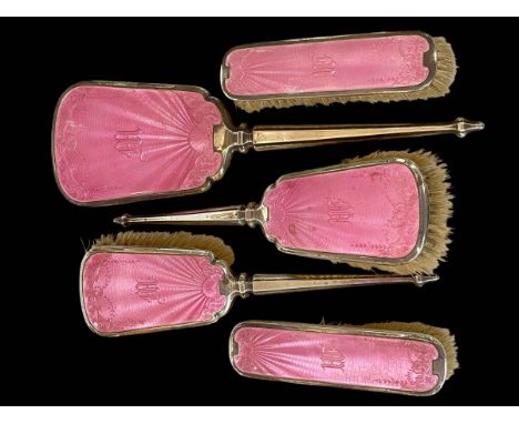 Silver and pink enamel five piece brush set, Birmingham 1928/30.