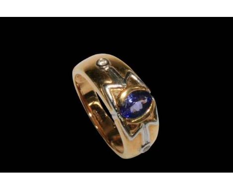 Tanzanite and diamond 18 carat gold ring, size N.