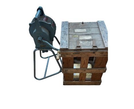 Vintage hand operated air raid siren with instruction leaflet and Suffolk Constabulary label.