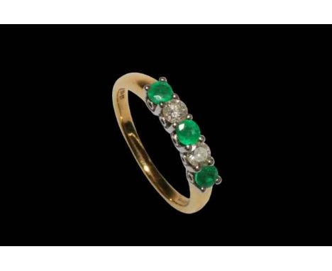 Emerald and diamond five stone 18 carat gold ring, size O.