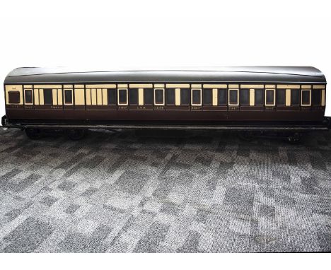 A 7¼" Gauge GWR 'Ride-on' Suburban Brake/3rd Coach by Aristocraft, with steel underframe and moulded body, finished in GWR br
