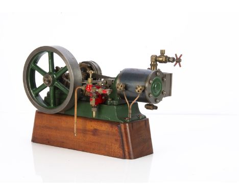 A Stewart Turner Live Steam 'No 9' Horizontal Engine, neatly machined and finished in green and red with blue-grey steel cyli
