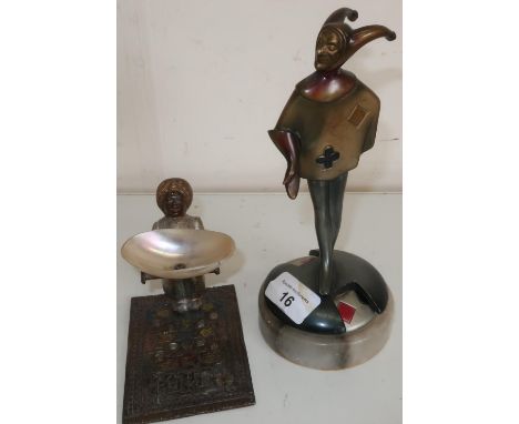 c. 1920's bridge marker in the form of a cast metal jester on marble base (A/F &nbsp;- repair to legs where they meet the bod