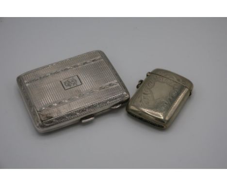 Birmingham silver hallmarked cigarette case engraved August 13th 1932 with engine turned detail and a silver plated vesta cas