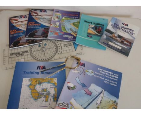 Selection of various sailing related books, navigational training books, compass projector etc 