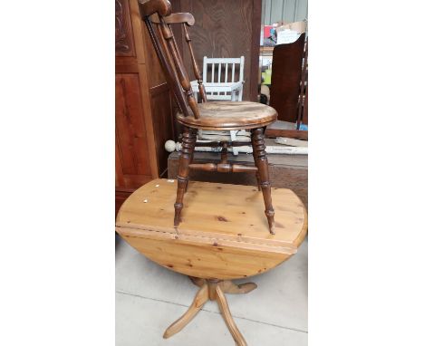 Modern pine drop-leaf kitchen table and a stick-back chair on turned supports (2) 