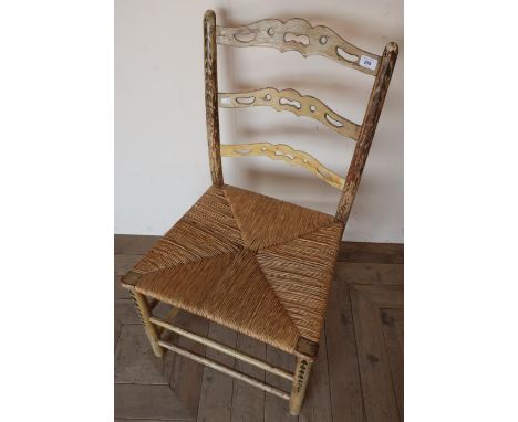 18th C country rush seated ladder back chair with traces of original paint, similar to a chair by William Treacher of High Wy