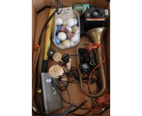 Scales hanging pan, various golf balls, carved wood items, vintage Polaroid camera, John Player matchboxes etc 