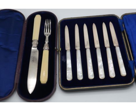 Cased Sheffield 1861 silver hallmarked and ivory handled knife and fork set and a cased set of Sheffield silver hallmarked bl