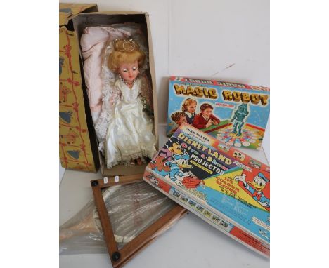 Vintage Slazenger tennis racket with frame and a small selection of boxed toys including The Amazing Magic Robot, Dollindoll 