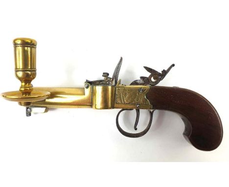 A 19th century flintlock tinder lighter/candle holder, engraved "London, Twigg" 18cm long