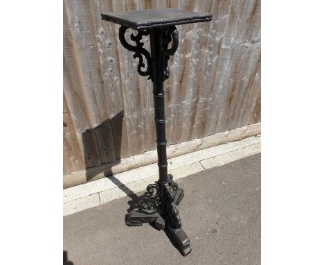 A 20th century bamboo style torchere stand, standing on tripod legs, 126cm high