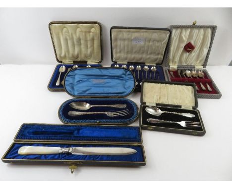 A cased set of silver bean end coffee spoons, Sheffield, 1932, 76.5g gross (2.46 Troy oz); a cased silver spoon and fork set,