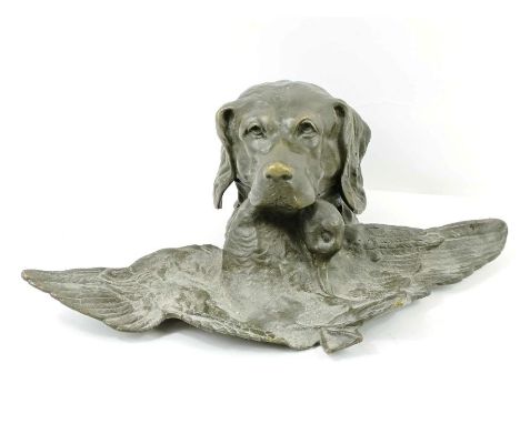 A late 19th/early 20th century cast metal French inkwell in the form of a spaniel holding a duck in it's mouth, marked Depose