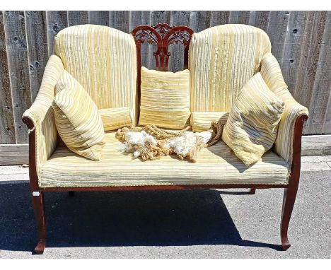 An Edwardian mahogany framed two seater sofa 