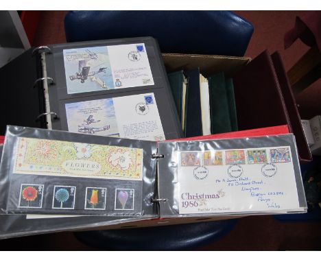 A Large Box of Stamp/Cover Albums, housing G.B FDC's, World collection of used stamps, a few G.B mint presentation packs, flo