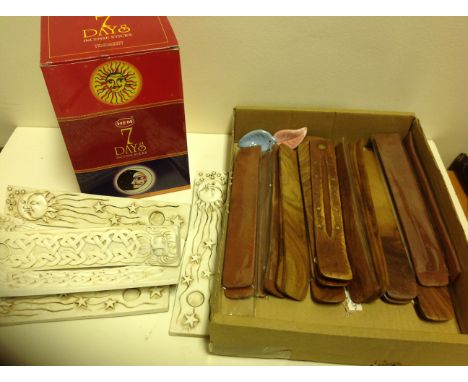One wholesale box of 7 Day incense sticks along with a quantity of holders including ceramic and wooden. Brand new.
