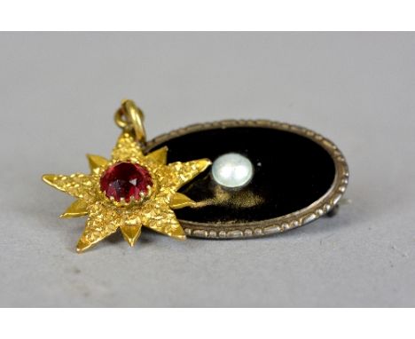 A MARIUS HAMMER ENAMELLED SILVER OVAL BROOCH, the centre raised white enamelling imitating pearl with black enamel surround, 