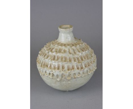 PETER HAYES (B.1946), an early ceramic vase of onion form, having incised decoration to the top part of the body, height appr