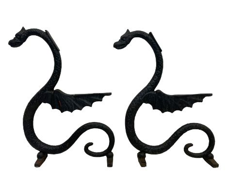 Cast iron bench ends in the form of winged dragonsDimensions: Height:&nbsp;81cm&nbsp; Length/Width:&nbsp;55cm&nbsp;