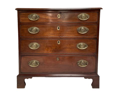 George III mahogany chest, moulded rectangular top over four graduating drawers, pressed oval plate handles decorated with li