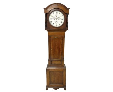 A mid-nineteenth century 8 day Oak longcase clock with a circular dial inscribed "JH Maughan, Gateshead", hood  with a curved