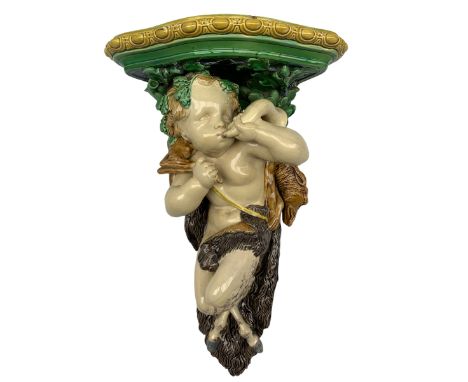 Early Victorian Minton Majolica wall bracket designed by Albert Carrier Belleuse, modelled as a Faun with a hunting horn, car