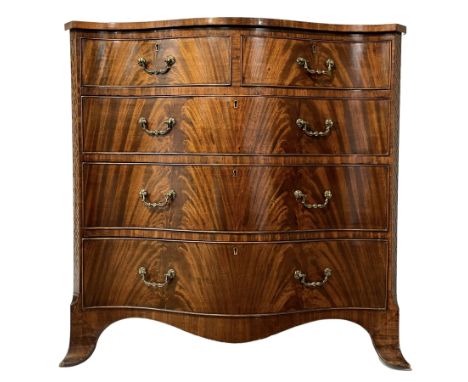 Georgian style figured mahogany serpentine chest, the banded top over two short and three long drawers, canted uprights corne