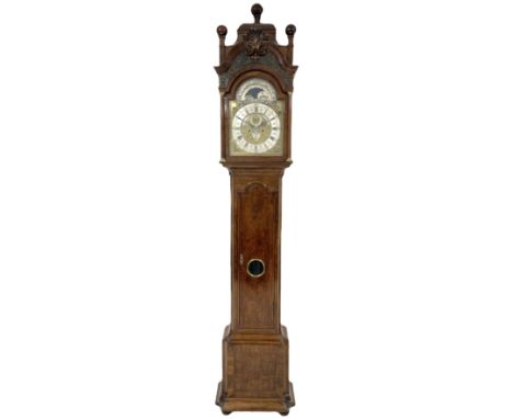 Late 18th century Dutch longcase clock by Pieter Swann, Amsterdam. In a walnut case with swan's neck pediment and raised cadd