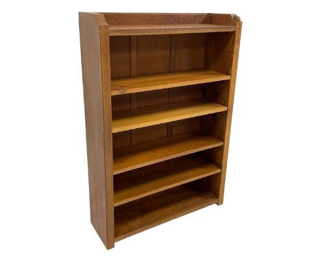 Mouseman - oak open bookcase, solid end supports with curved front corners, carved with mouse signature, with four adjustable