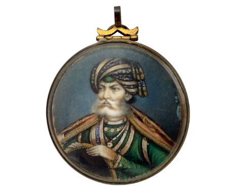 Delhi School - Mid to late 19th century circular portrait miniature, watercolour on ivory of an Indian gentleman D4cm. This i