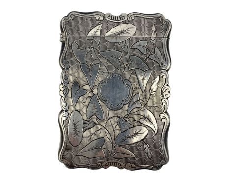 Mid Victorian silver card case of rectangular form, engraved to both sides with bindweed against an engine turned ground and 