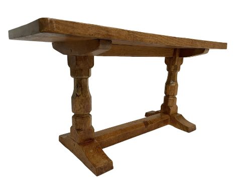 Mouseman - adzed oak rectangular coffee table, octagonal pillar supports on sledge feet joined by stretcher, carved with mous