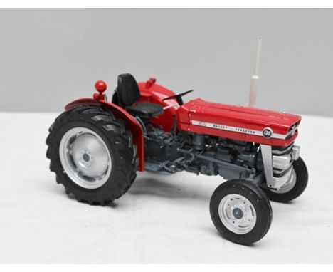 UNIVERSAL HOBBIES A 1:16 SCALE DIE-CAST MODEL OF A MASSEY FERGUSON 135 TRACTOR (red) 