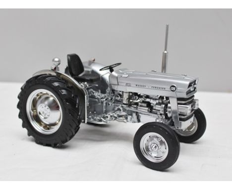 UNIVERSAL HOBBIES A 1:16 SCALE LIMITED EDITION DIE-CAST MODEL OF A MASSEY FERGUSON TRACTOR (silver), no.778/1000 