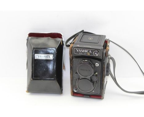 A YASHICA MAT-124 G TWIN LENS REFLEX CAMERA in leather case 