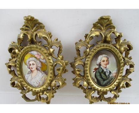 A PAIR OF 20TH CENTURY EUROPEAN ENAMEL PAINTINGS OF GEORGIAN PORTRAITS, a man in a powdered wig holding a letter and a lady i