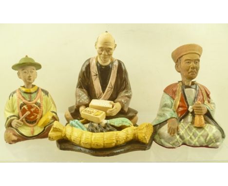 TWO CHINESE CERAMIC "NODDING HEAD" SEATED FIGURES, polychrome decorated, tallest 13cm high, together with ONE OTHER ORIENTAL 