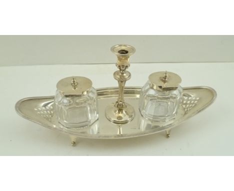 ATKIN BROTHERS A LATE VICTORIAN SILVER STANDISH, fitted two facet cut glass inkwells with silver covers and a central taper s