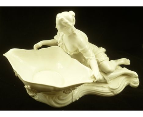 A DERBY TYPE CERAMIC FRUIT BOWL moulded with classical figure mount, in the white, 19cm high 