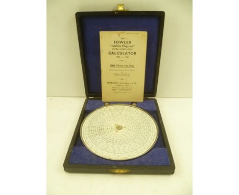 A FOWLERS 'JUBILEE MAGNUM' EXTRA LONG SCALE CALCULATOR, 12cm diameter, cased with instructions 