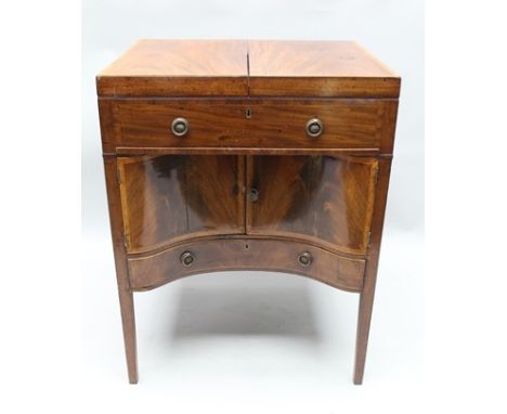 A MID 19TH CENTURY MAHOGANY AND SATIN WOOD CROSS BANDED CAMPAIGN STYLE DRESSING CHEST having fold out caddy top revealing com