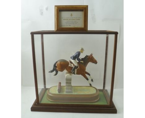 A ROYAL WORCESTER PORCELAIN MODEL OF "STROLLER AND MARION COAKES" BY DORIS LINDNER, limited edition no.731 of 750, under purp